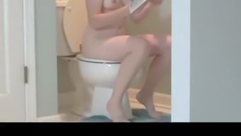 MILF caught naked in the toilet