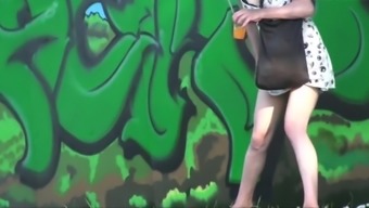 Girls pissing outdoor at festival