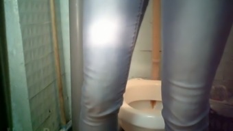 Chunky pale skin white chick in jeans urinates in the toilet