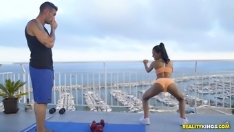 apolonia lapiedra and her private trainer are working out on the rooftop