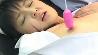 Japanese girl getting her pussy lips stretched with fingers in Doctor's office