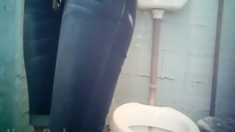 Hot blonde white chick in tight jeans caught on cam in the public restroom
