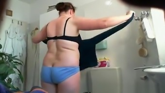 Chubby mature changing in bathroom