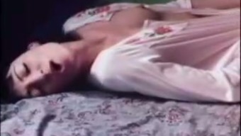 Sleeping brunette MILF in white gown tickles her wet cunt on bunk bed