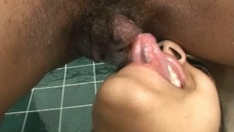 Girls sucking a huge erect clit