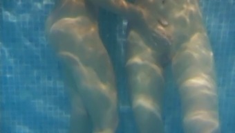 Alluring lesbian teen messing around in the swimming pool hardcore