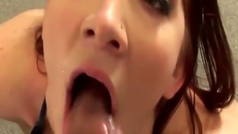  Hot redhead gags on a monster dick