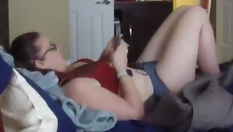 BBW mast on bed watching porn on phone