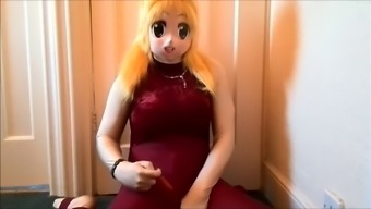 Cross dressing gay slut wears his sex doll outfit