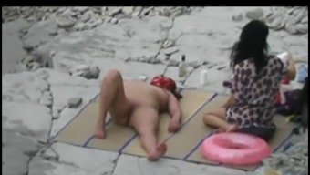 Nude Beach - two women on the Rocks