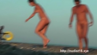 Sexy nudist babes filmed playing on the nude  beach