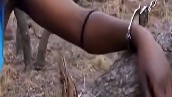 African slave gets pounded by white dong outdoors