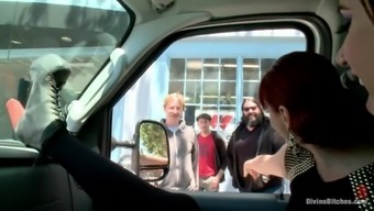 A dude gets tormented by two redhead mistresses in a minivan