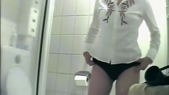 Office colleague filmed while peeing and farting