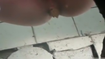 Desperate woman takes a poop in close up footage