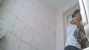 White mature sexy woman puts paper on the shitter to pee