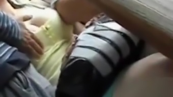 Stunning brunette lady has her huge boobs groped in the bus