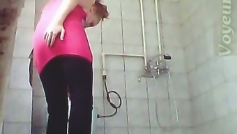 Mature chunky white woman filmed on cam in the restroom