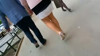 Attractive blonde lady jiggles her butt as she walks