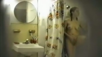 My hidden camera caught my sexy roommate masturbating in shower