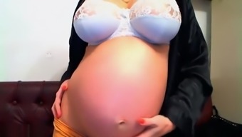 Pregnant Woman Is Showing Off