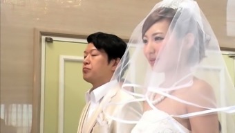 Slutty Japanese bride in lingerie indulges in wild group sex