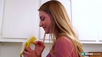Pink top blue eyed blond loves teasing with her banana