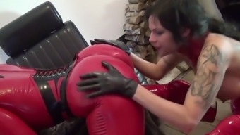 Two Sluts In Red Latex Play With Each Other and Fuck Guy
