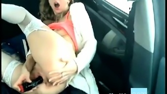 Russian Girl with dildo in her car