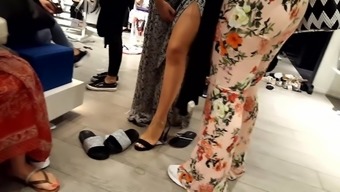 her split sexy long legs feets show at shopping