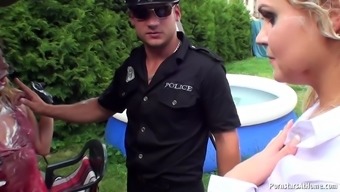 A cop shows up and fucks several chicks at a picnic