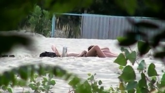 Beach voyeur watches a horny amateur couple enjoying hot sex