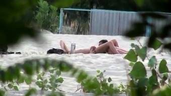 Beach voyeur watches a horny amateur couple enjoying hot sex
