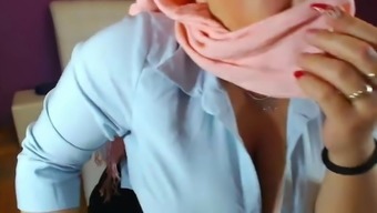 Muslim in hijab fondles her huge boobs
