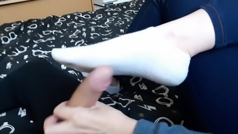 My hand and socks rock my bf's cock. Quite rough!