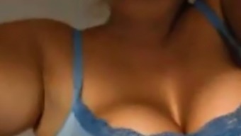 Milf shaking her huge tits on cam