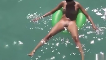 Sexy Naked Milfs Sunbathing Nude in the water voyeur spy cam