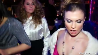 Drunk girls get bold and eat out wet pussy in a club