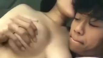 Indonesia big tits teen couple sex in the car