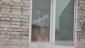 Naked Step mom washes window son spies on mommy. Naked in public. Spying