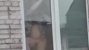 Naked Step mom washes window son spies on mommy. Naked in public. Spying