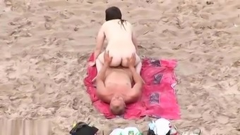 Horny matures caught at the nude beach