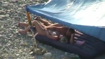 Real swingers at a nudist beach