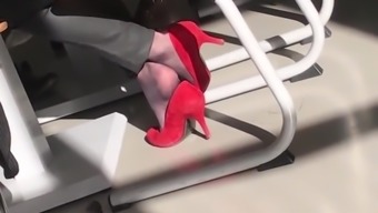 secretary in nylon socks and red high heels