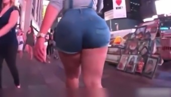 Juicy latin booty in tight jean shorts