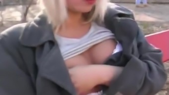 blonde girl peeing in public