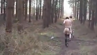 UK Sara and Jade strip in the woods