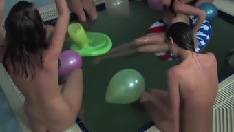 Russian/Ukrainian nude girls playing in pool