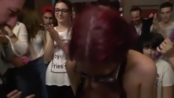 Redhead slave getting facials in public
