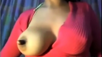 Big tits babe teasing with her huge nipple